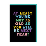 Black birthday card with chunky pastel capitals and no illustration