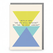 Humorous Netflix Judgment greeting card featuring bold geometric triangles in blue, teal, and yellow with the quote “Netflix asks ‘Are you still watching?’ Me: ‘Are you still judging?’”.