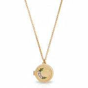 Nightshade Moon Round Gold Locket Necklace on gold chain – closed view.