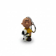 Full front view of Charlie Brown hugging Snoopy keyring against a white background.