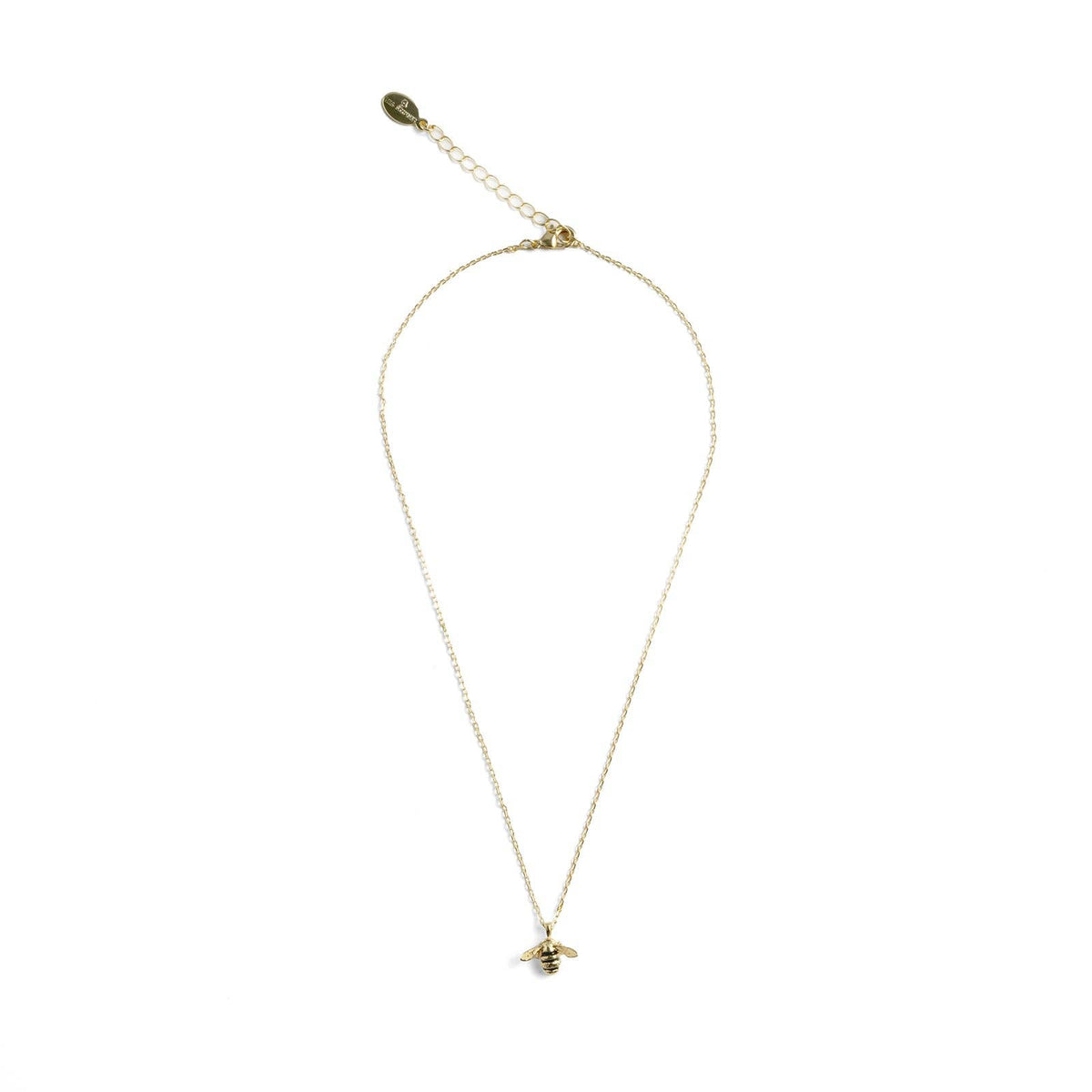 Bee pendant on presentation showing Bill Skinner branding
