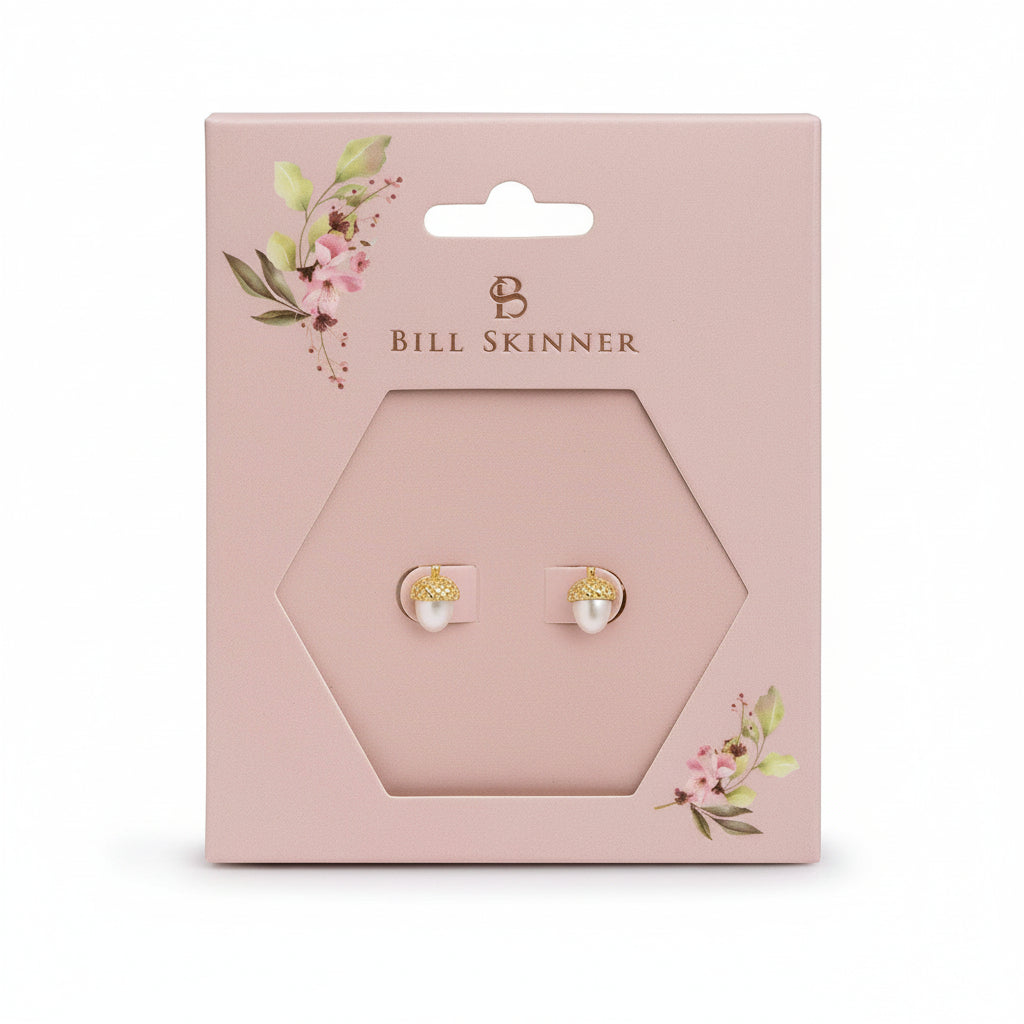 Acorn and Pearl Stud Earrings on a pink Bill Skinner gift card