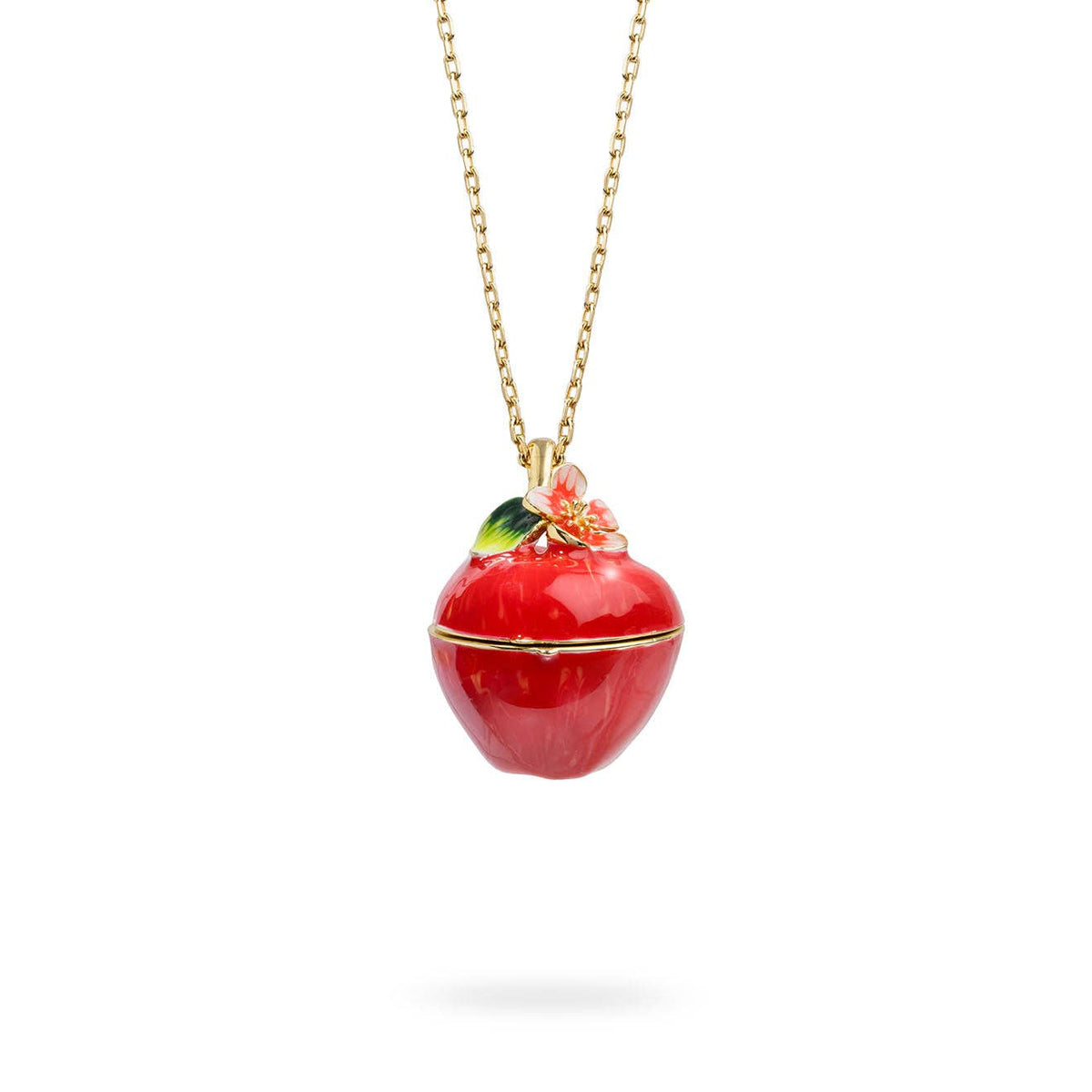 Closed red enamel apple blossom locket pendant with gold chain on white background