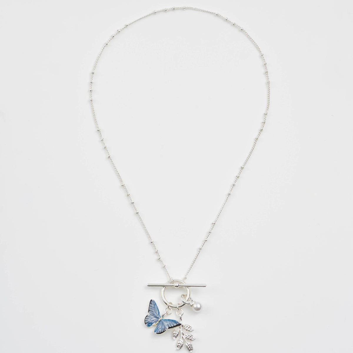 Blue butterfly silver necklace full length beaded chain on white