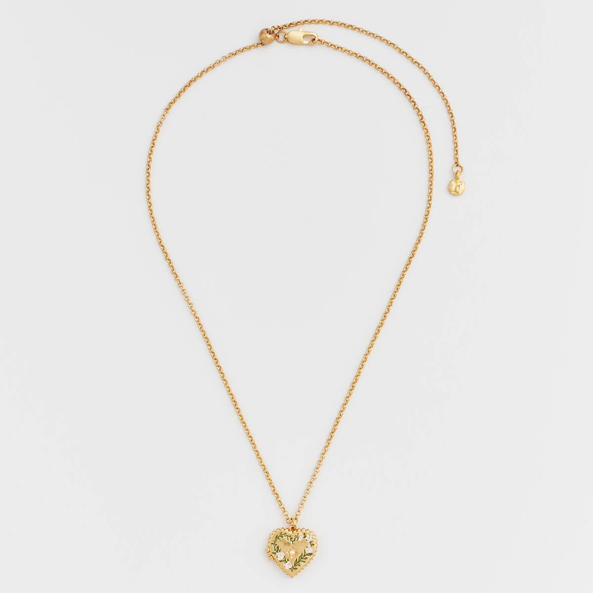 Jasmine Heart Locket Necklace laid flat showing adjustable chain and clasp.