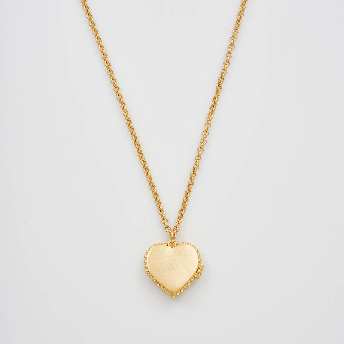 Jasmine Heart Locket Necklace on gold chain, front view against a white background.