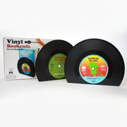Vinyl bookends set of two beside retro packaging box on white