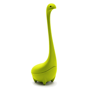 Lime green Baby Nessie tea infuser with a hinged base on a white background