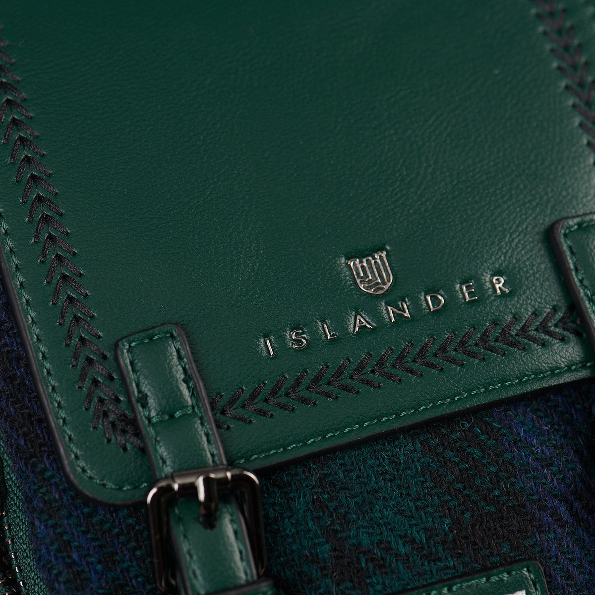 Close-up of the Islander logo and braided stitching on the flap