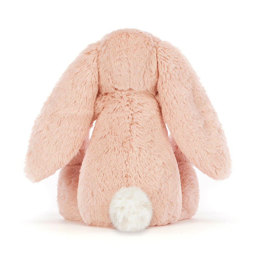 Bashful Blush Bunny back view with fluffy white bobtail, white background