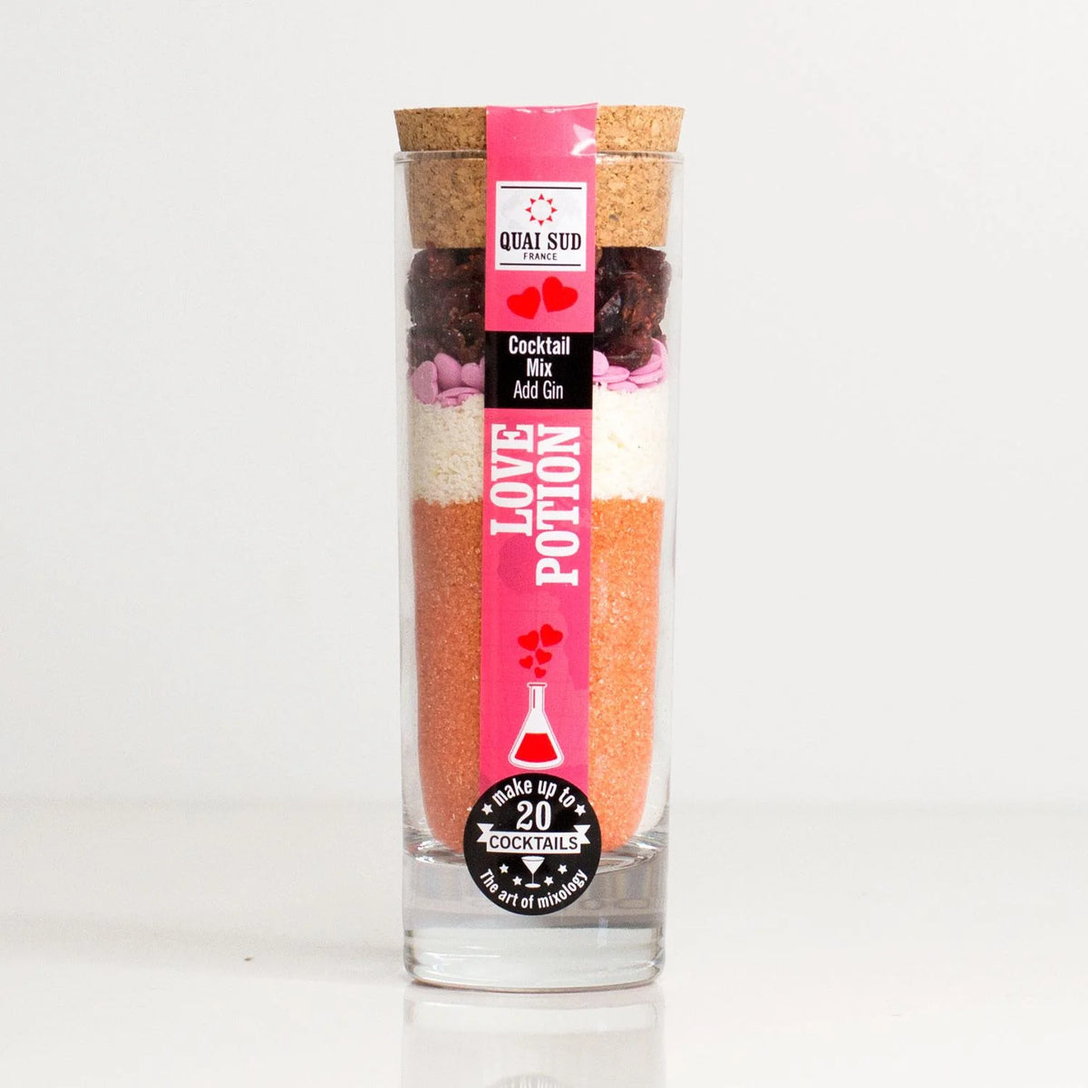 Love Potion Gin Cocktail Mix in tall glass jar with cork lid.