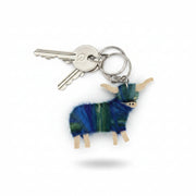 Blue Highland cow keyring, a small wooden coo hand-wrapped in blue-dyed mohair with a stainless steel key ring