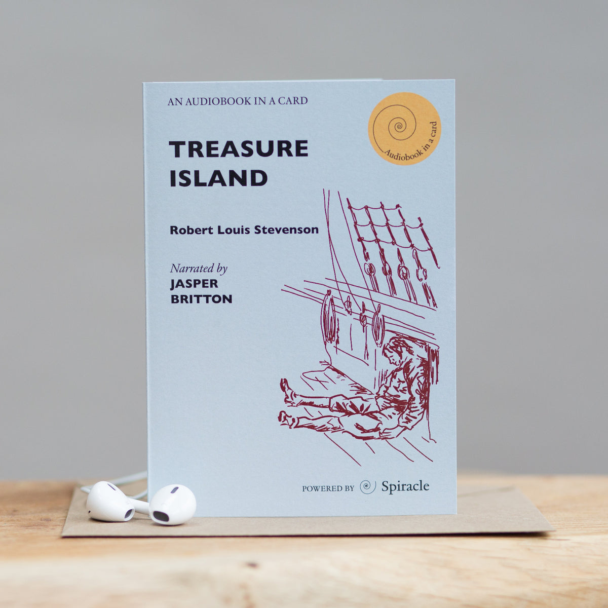 Treasure Island audiobook card styled with its kraft envelope